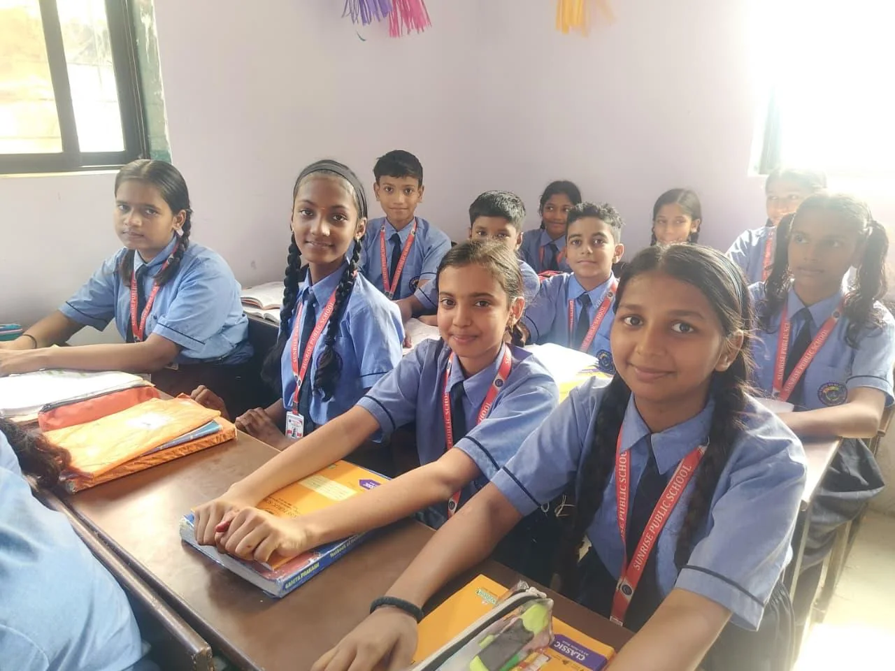 Sunrise Public School students smiling in the classroom